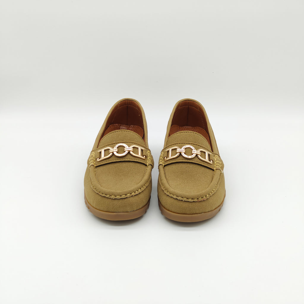 Pair of tan loafers with gold accents on a white background
